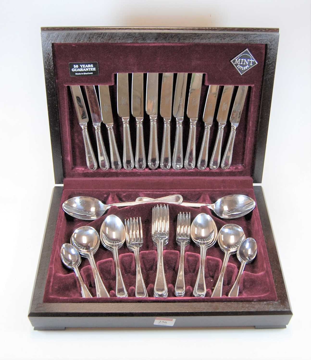 A modern mint cutlery 6-place setting stainless steel cutlery suite in fitted canteen