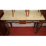 A Victorian mahogany and canvas clad hall table (lacking both drawers), width 115cm