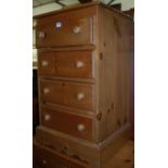 A modern pine narrow chest, of four long drawers, w.50cm