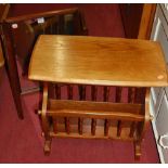 A stained beech twin division magazine table; together with a triptych dressing mirror (2)