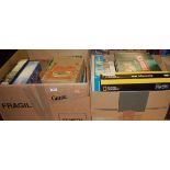 Two boxes of various games and puzzles including a GWR jigsaw puzzle The Cheltenham Flyer, etc