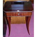 A 19th century Continental mahogany and brass bound hinge topped sewing table, having slender curved