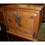 A modern pine and metal bound low chest, having single fallfront door, w.77cm