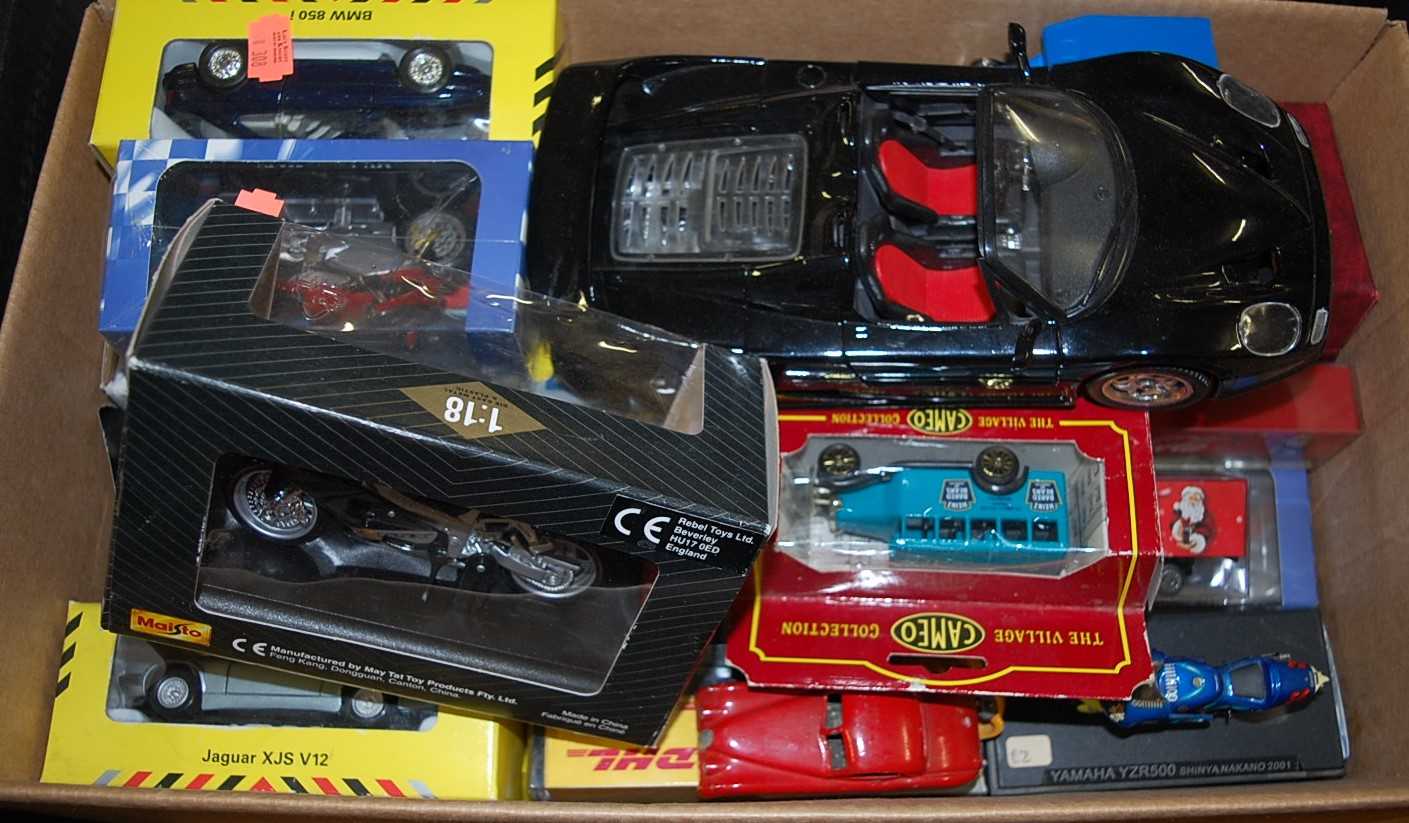 A box of modern issue diecast to include Maisto Suzuki motorcycle, Mira Ferrari F50 etc