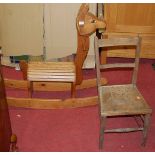 A contemporary pine childs rocking horse; together with a panel seat childs bedroom chair, and a