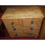 A Victorian pine round cornered chest of two short over two long drawers, on turned supports, w.