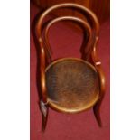 A circa 1900 Austrian childs bentwood panelled seat elbow chair, possibly Thonet, labelled verso,