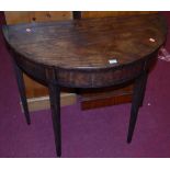 An early 19th century mahogany D-end fold-over tea table, on tapering supports, w.91cm