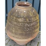 A large garden terracotta olive vase, of ovoid ribbed form, h.85cmCondition report: Some minor