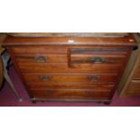 An Edwardian walnut chest of two short over two long drawers, w.92cm