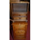 A contemporary oak two drawer low office filing cabinet; together with an oak part open low two