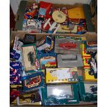 Three boxes of mixed diecast to include boxed Matchbox cars, and Vanguard, Dinky Toys, USS