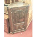 A 19th century joined oak low single door corner cupboard, w.72cm