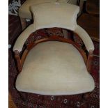 A pair of Edwardian walnut and upholstered parlour tub elbow chairs, width 62cm