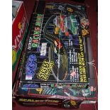 A boxed Scalextric F1 racing set and a desk top Racing Minis box set