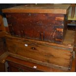 Two late 19th century stained pine hinge topped tool chests, the largest w.82cm