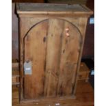 A rustic pine single door hanging wall cupboard, w.55cm