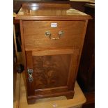 An Edwardian mahogany ledgeback single door bedside cupboard, having single upper drawer, w.42cm