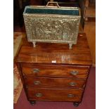 A 19th century chest of three long drawers, on turned supports, w.62cm; together with an embossed