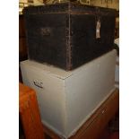 A canvas clad and studded hinge topped travelling trunk, w.76cm; together with a painted hinge