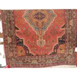 A Persian style machine woven red ground Tabriz rug, 200x140cm