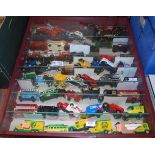 A display case for models containing a quantity of mixed modern issue diecast to include Lledo and