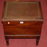 A 19th century mahogany hinge topped commode (lacking interior), on turned supports, w.42.5cm