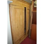 A French reclaimed pine double door armoire having twin short lower drawers, width 152cm