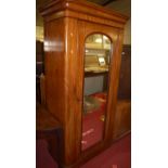 A Victorian mahogany singled arch mirrored door round cornered wardrobe, w.103cmCondition report: