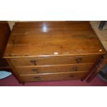 An early 20th century oak ledgeback chest of three long graduated drawers, w.96cm