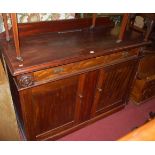 An early Victorian mahogany ledgeback double door side cupboard, having single frieze drawer, w.