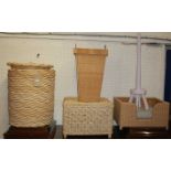 A collection of sundry contemporary wicker wares to include laundry baskets, stool, dog bed, etc (