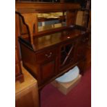 An Edwardian mahogany, satinwood and boxwood strung mirrorback side cabinet, having astragal