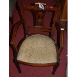 An Edwardian mahogany and floral satinwood inlaid elbow chair