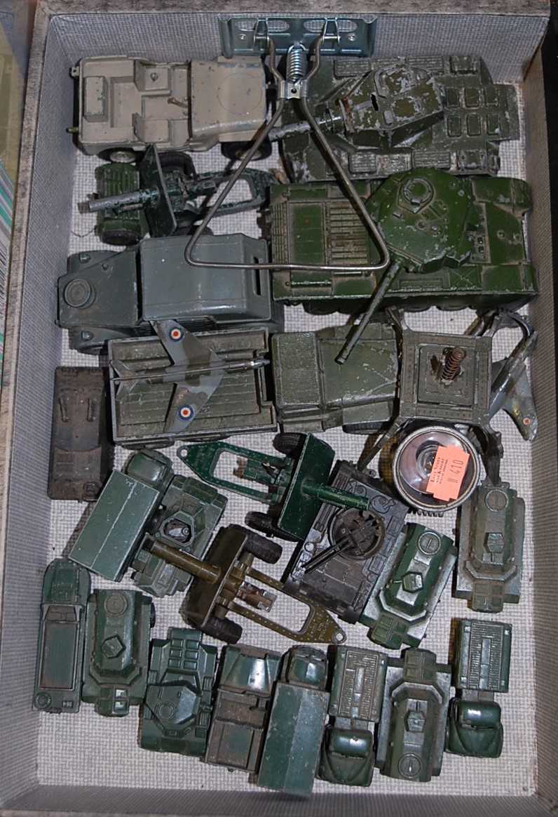 A box containing a quantity of military diecast vehicles to include Dinky Toys, Matchbox Lesney etc