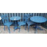 Two blue painted galvanised metal circular garden tables, each with pierced floral decoration,