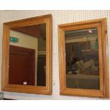 A moulded and stained beech rectangular wall mirror, 75x62cm; together with a further smaller