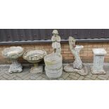 Two reconstituted stone pedestal garden urns; together with a pair of circular bucket form planters,