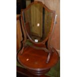 An Edwardian mahogany circular revolving Lazy-Susan; together with an Edwardian mahogany shield