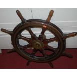 An oak and mahogany brass bound ships wheel, dia.75cmCondition report: UK Shipping on this lot £25