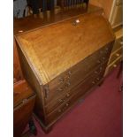 A George III mahogany slopefront four drawer writing bureau, w.106cm