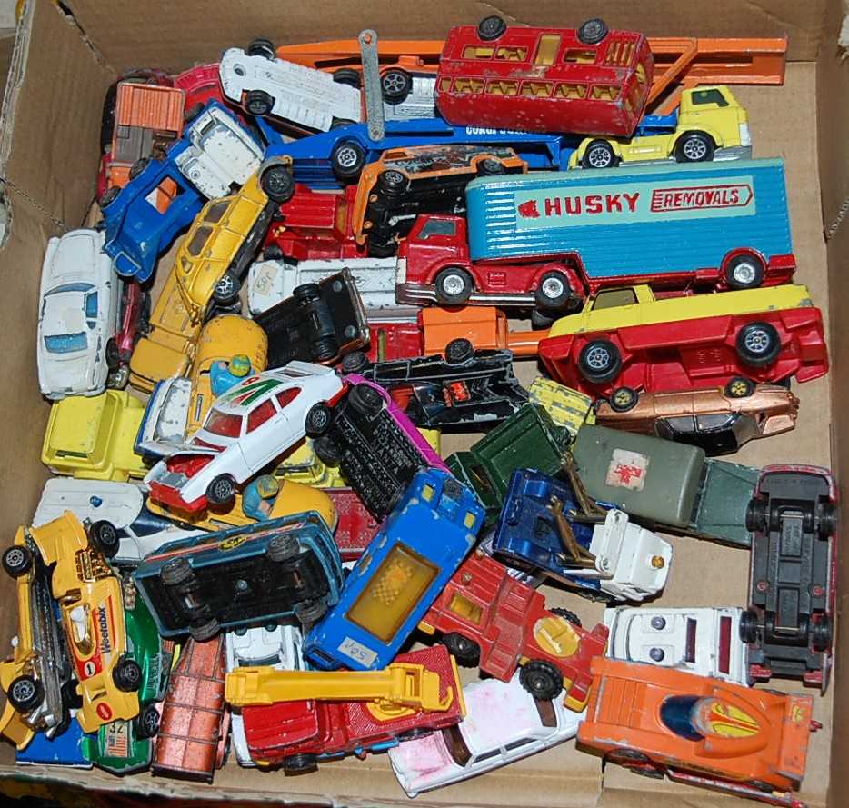 Four boxes of mixed toys to include Corgi Juniors, Matchbox Superkings, Triang Cranes, modern