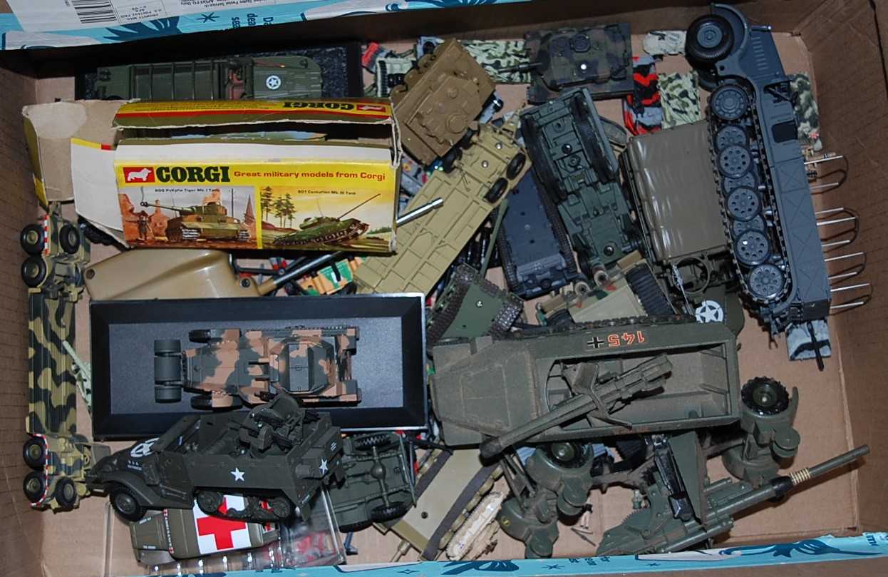 A box of mixed military vehicles to include Dinky toys tank destroyer, Corgi tank and various