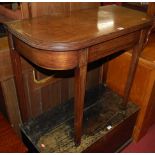 An early 19th century mahogany D-end fold-over tea table with ebony inlays, width 86.5cm