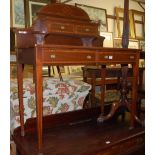 An Edwardian mahogany, satinwood strung and crossbanded lady's writing table, having raised two