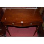 A reproduction mahogany serpentine front two drawer side table, width 84cm