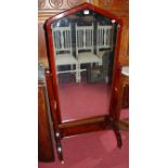 A Victorian stained pitched pine cheval mirror, the mirror plate of lancet arched form, height