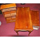 Reproduction yew wood occasional furniture to include; a coffee table and two CD racks (3)