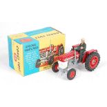 A Corgi Toys No. 66 Massey Ferguson 165 tractor comprising of red and grey body with red hubs,