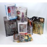 A collection of boxed and carded mixed action figures to include transformers, The X Files,